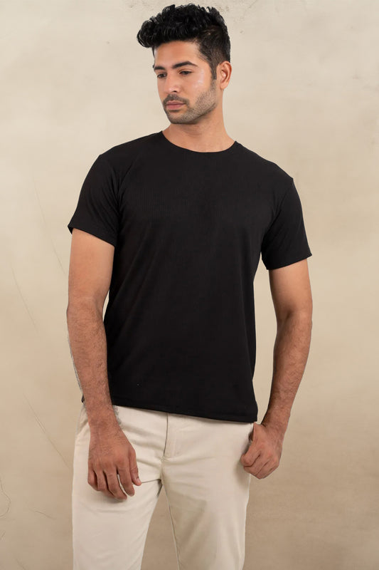 Overall view of the black crewneck t-shirt, highlighting its versatility and suitability for various occasions