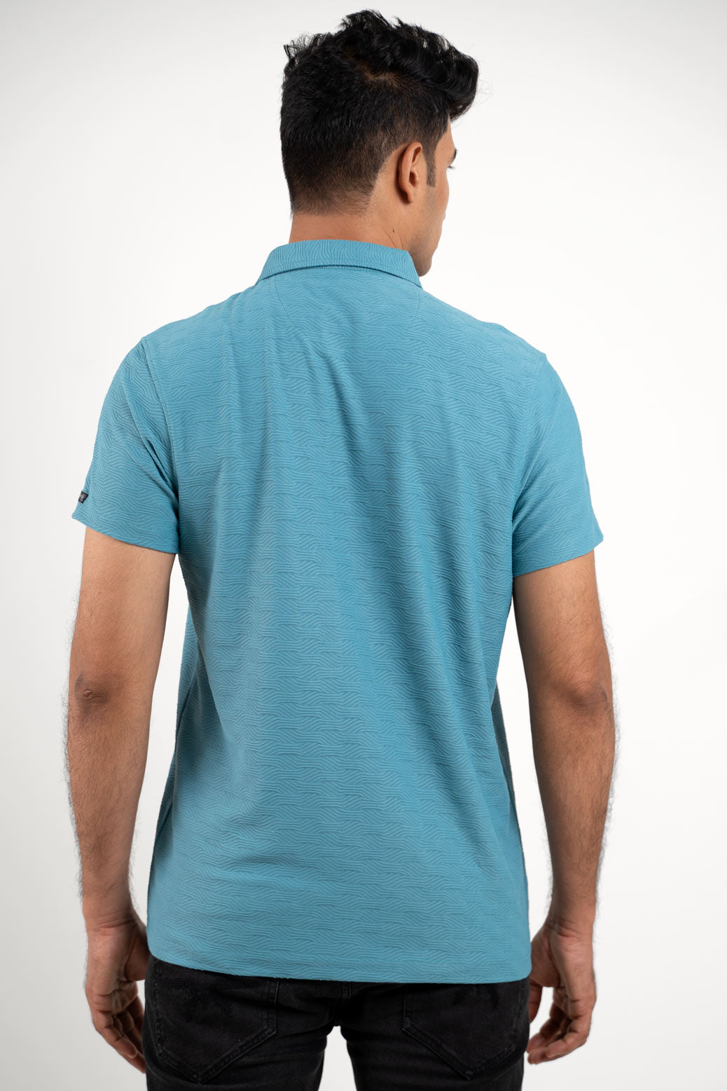 man wearing blue tshirt Back View