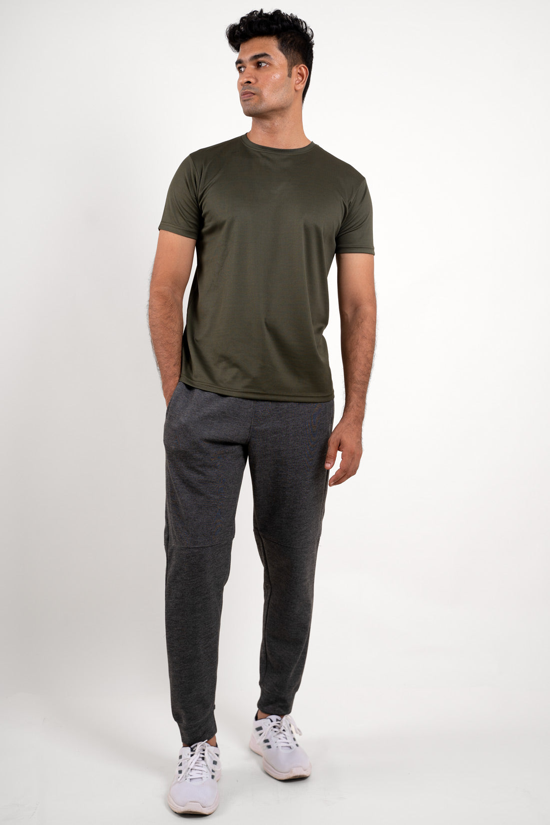 Overall view of the olive crew neck t-shirt, capturing its athletic style and versatile appeal.