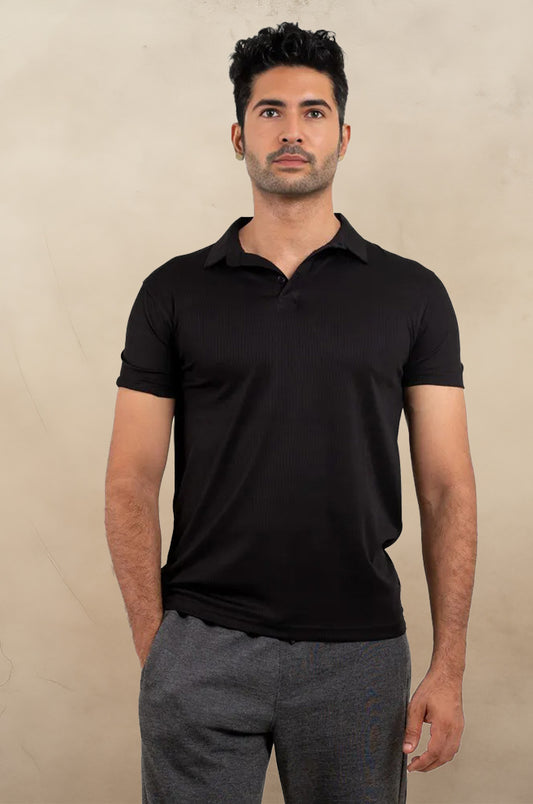 Front view of an active black polo t-shirt, featuring a sleek and sporty design