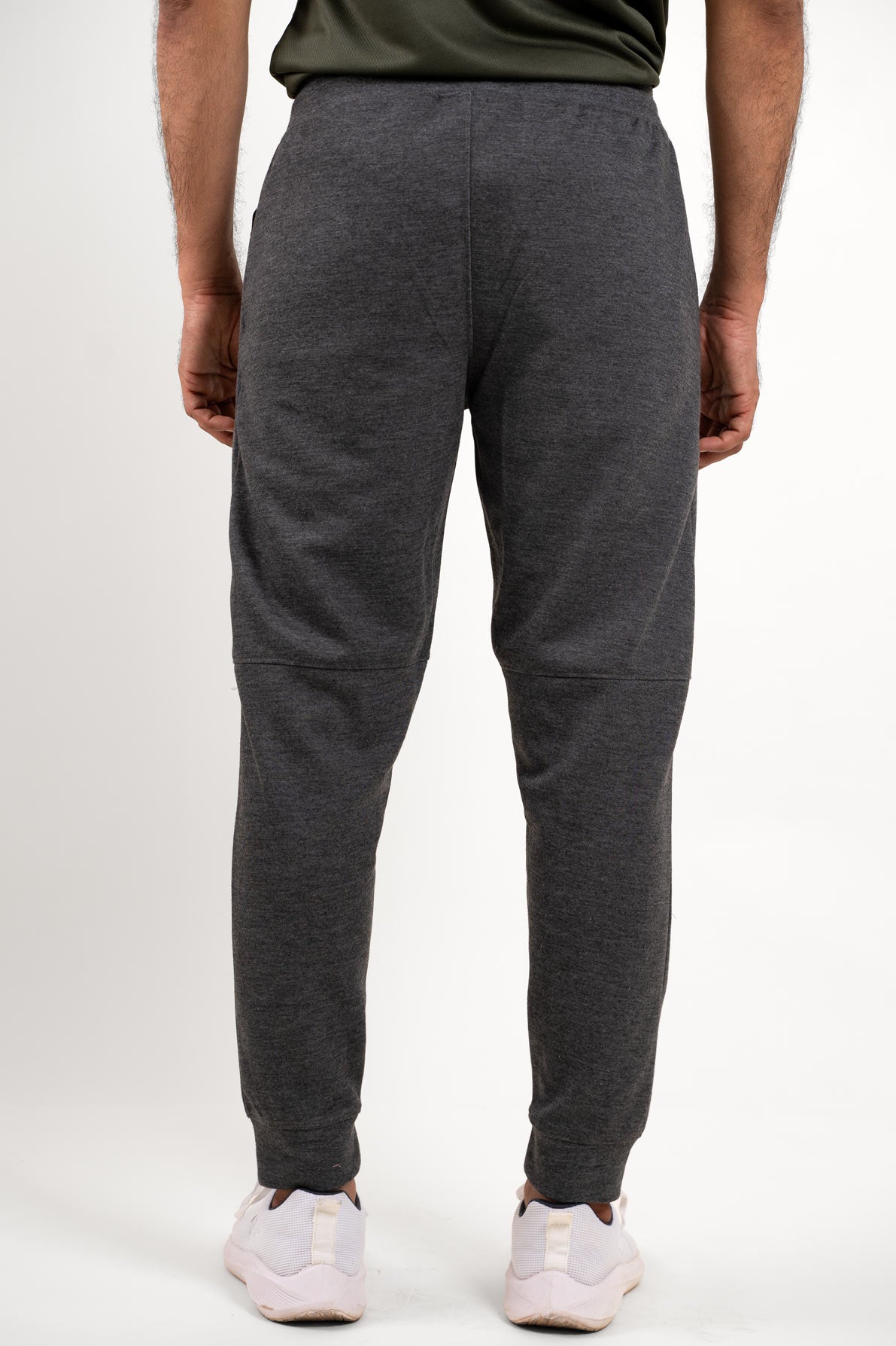 Back view of the essential grey joggers, highlighting their clean lines and functional appeal