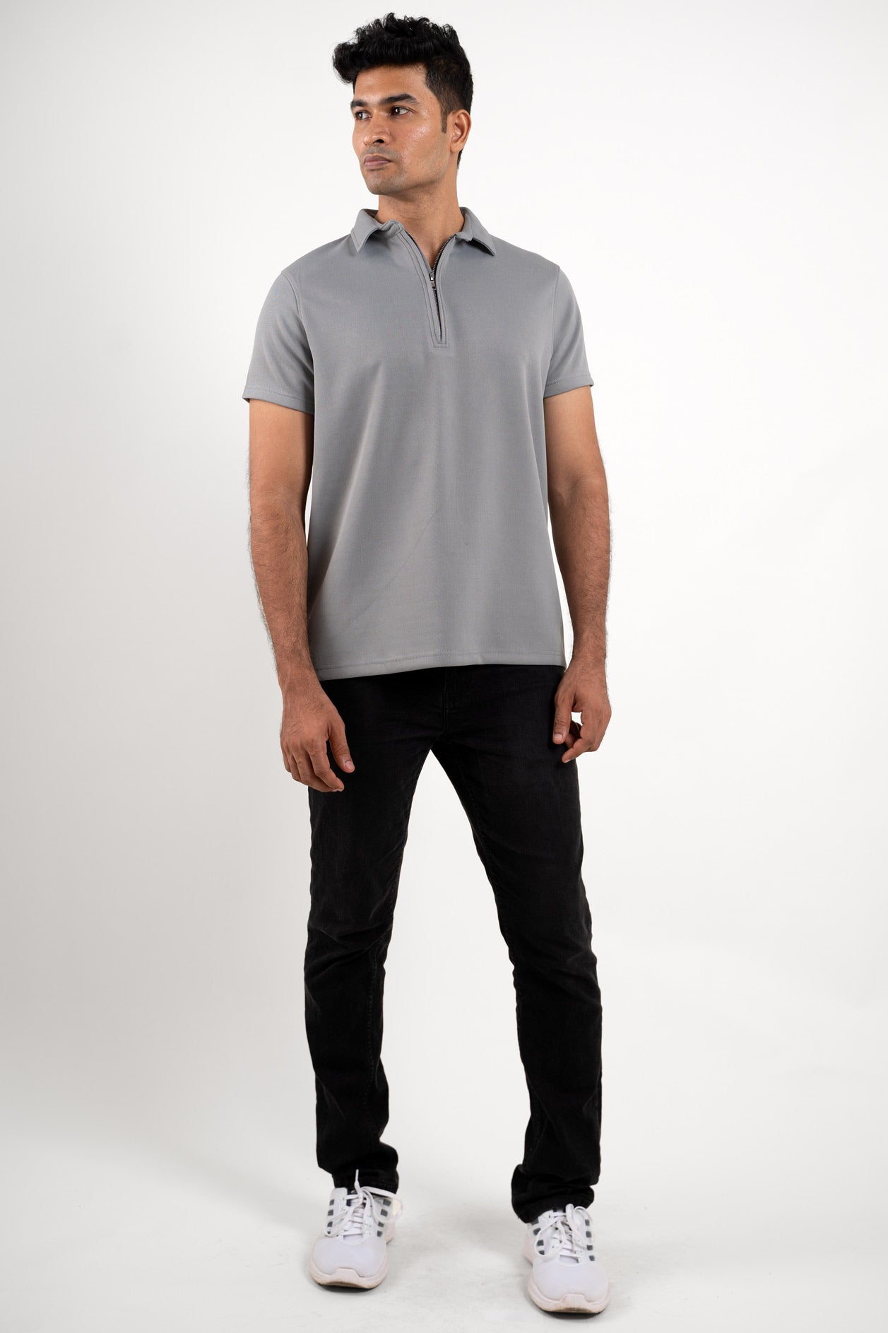 Full-length image of the grey zipper polo shirt, providing a comprehensive look at its overall fit and style