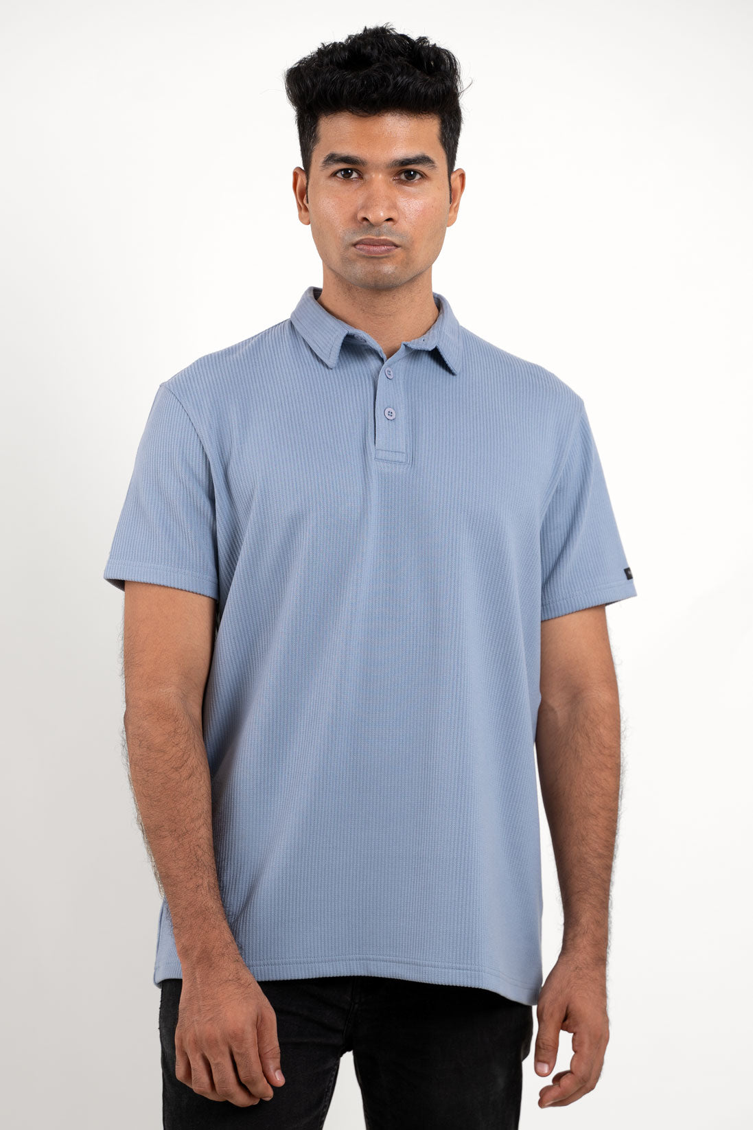 Blue polo regular fit t-shirt worn by man, front view emphasizing comfortable fit and classic style