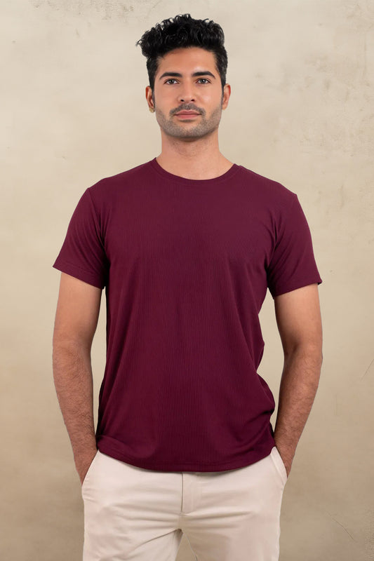 Front view of a vibrant red crewneck t-shirt, adding a bold pop of color to any outfit