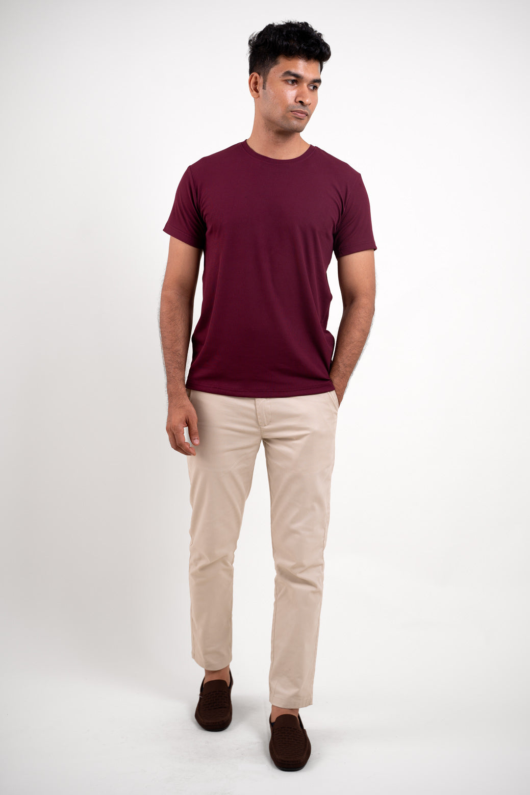 Full-length image of the red crewneck t-shirt, providing a comprehensive look at its overall fit and style