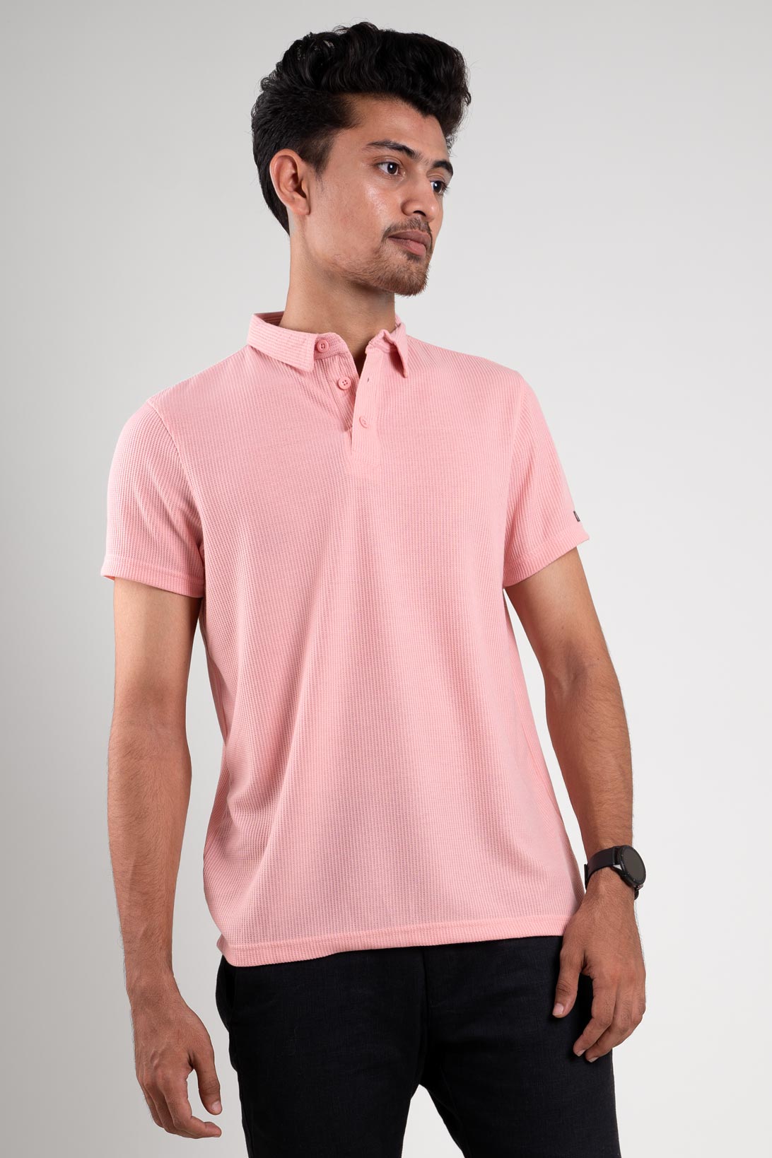 Front view of a classic pink solid polo t-shirt, exuding timeless style and comfort.